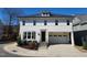 Charming two-story home features a two-car garage, manicured landscaping, and a welcoming entryway at 1317 Pecora Ln, Raleigh, NC 27607