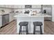 Charming kitchen featuring an island with granite countertop and stainless steel appliances at 1752 Post Oak Dr, Haw River, NC 27258