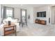 Inviting living room featuring natural light, neutral decor, and comfortable seating at 1752 Post Oak Dr, Haw River, NC 27258