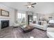 Spacious living room with a fireplace, comfortable seating, and open layout offers an ideal space for relaxation at 1752 Post Oak Dr, Haw River, NC 27258
