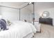 Tranquil main bedroom showcasing a luxurious bed, comfortable seating, and elegant decor at 1752 Post Oak Dr, Haw River, NC 27258
