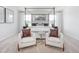 Serene main bedroom features a four-poster bed, comfortable seating, and tasteful decor at 1752 Post Oak Dr, Haw River, NC 27258