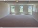 Upstairs bonus room with ample natural light at 190 Sage Ln # 015, Four Oaks, NC 27524