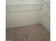 Unfinished closet with wire shelving, awaiting your personalized design and storage solutions at 190 Sage Ln # 015, Four Oaks, NC 27524
