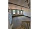 Spacious two-car garage with ample lighting, perfect for parking and storage needs at 190 Sage Ln # 015, Four Oaks, NC 27524