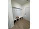 Mud room with a built-in bench, coat hooks and access to the garage at 190 Sage Ln # 015, Four Oaks, NC 27524