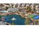 Aerial view of neighborhood amenities including pool, pond, and tennis courts at 200 Indian Elm Ln, Cary, NC 27519