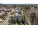An aerial view of a beautiful neighborhood showcasing well-maintained homes and mature trees at 200 Indian Elm Ln, Cary, NC 27519