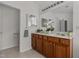 Bathroom features a double vanity, large mirror, and decorative accents at 200 Indian Elm Ln, Cary, NC 27519
