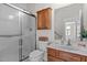 The bathroom features a glass shower and vanity at 200 Indian Elm Ln, Cary, NC 27519