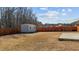 The property features a fenced backyard with a storage shed and plenty of open space at 2007 Bunnfield Dr, Zebulon, NC 27597