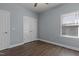 Bedroom showcases a large closet and beautiful wood-look flooring at 2007 Bunnfield Dr, Zebulon, NC 27597