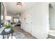 Foyer with a staircase, view of living room, and wood-look flooring at 209 Deodora Ln, Cameron, NC 28326