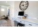 Bright and efficient built-in home office space with a large clock and sleek, modern design at 209 Deodora Ln, Cameron, NC 28326