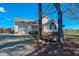 Charming home with an attached garage, vinyl siding, a manicured lawn, and lovely landscaping at 2105 Antioch Church Rd, Timberlake, NC 27583