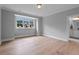 Bright, spacious bedroom with hardwood floors and large window with neighborhood view at 2325 Ballywater Lea Way, Wake Forest, NC 27587