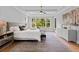 Beautiful bedroom with tray ceiling, large windows, and an ensuite bathroom at 2325 Ballywater Lea Way, Wake Forest, NC 27587