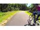 Scenic bike path surrounded by lush greenery, perfect for outdoor activities at 2325 Ballywater Lea Way, Wake Forest, NC 27587