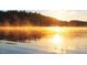 Warm sunlight reflecting over the lake at 2325 Ballywater Lea Way, Wake Forest, NC 27587