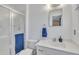Well-lit bathroom with a glass-enclosed shower and a white vanity at 2409 Parkway Dr, Raleigh, NC 27603