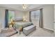 Bedroom with lots of natural light, a queen-sized bed, and neutral decor at 2409 Parkway Dr, Raleigh, NC 27603