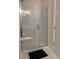 Bathroom with a clear glass shower and white subway tile at 2441 Campus Shore # 402, Raleigh, NC 27606
