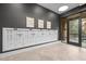 Mailboxes in common area with modern design, illuminated with recessed lighting at 2441 Campus Shore # 402, Raleigh, NC 27606