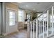 Bright entryway featuring modern finishes, and an open staircase leading to the upper level at 2465 Englemann Dr # 365, New Hill, NC 27562