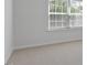 Sunny bedroom with soft carpet and a window, perfect for a peaceful retreat at 261 Hawksmoore Ln, Lillington, NC 27546