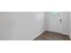 Bright foyer features wood-look floors, neutral walls, and a white front door at 261 Hawksmoore Ln, Lillington, NC 27546