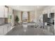 Spacious kitchen with granite countertops, stainless appliances, and an adjacent dining area at 269 Hawksmoore Ln, Lillington, NC 27546