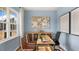 Office with light blue walls, natural light, modern artwork and stylish furniture at 269 Hawksmoore Ln, Lillington, NC 27546