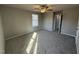 Comfortable bedroom with plush carpeting, ceiling fan and lots of natural light at 271 Starry Sky Dr, Benson, NC 27504