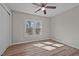 Bedroom with vinyl flooring, neutral paint, and a ceiling fan at 2810 Hickory Hill Rd, Burlington, NC 27215