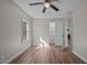 Bedroom featuring vinyl floors, neutral paint, ceiling fan, closet and a window at 2810 Hickory Hill Rd, Burlington, NC 27215