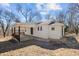 Charming home featuring a welcoming covered porch and ample natural light at 2810 Hickory Hill Rd, Burlington, NC 27215