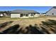 The home's backyard features a newly built patio and vinyl siding at 349 Earnest Way # 21, Kenly, NC 27542