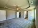 Large main bedroom boasts plush carpeting, tray ceiling, and convenient access to a walk-in closet and private bath at 349 Earnest Way # 21, Kenly, NC 27542