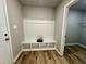 Functional mudroom area featuring a built-in bench with storage, providing a convenient spot to organize essentials at 349 Earnest Way # 21, Kenly, NC 27542
