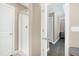 A glass shower and a hall entryway are showcased in this bathroom at 3517 Eastern Branch Rd, Raleigh, NC 27610