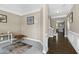 Spacious foyer with neutral paint, crown molding, and hardwood floors leading to the living areas at 3517 Eastern Branch Rd, Raleigh, NC 27610