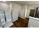 Modern bathroom featuring a glass-enclosed shower and wood-look flooring at 377 Earnest Way, Kenly, NC 27542
