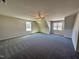 Large bonus room with carpet, a ceiling fan and lots of natural light at 377 Earnest Way, Kenly, NC 27542