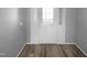 Entryway of a home with gray walls and wood look flooring at 3804 Prince Noah, Wake Forest, NC 27587