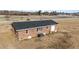 Brick home with a well-maintained roof, and AC, located close to roads, offering a blend of comfort and convenience at 4459 N Old Carriage Rd, Rocky Mount, NC 27804