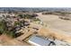 Property aerial view with fields, roads, and neighboring homes, creating a peaceful and private setting at 4459 N Old Carriage Rd, Rocky Mount, NC 27804