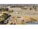 Expansive aerial view showcasing the home, surrounding land and neighborhood, and nearby cultivated fields, offering a rural lifestyle at 4459 N Old Carriage Rd, Rocky Mount, NC 27804