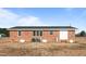 Back of brick home with yard at 4459 N Old Carriage Rd, Rocky Mount, NC 27804