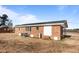 Back of brick home with yard at 4459 N Old Carriage Rd, Rocky Mount, NC 27804