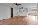 Open-concept living space connecting to the kitchen, featuring hardwood floors and ample natural light at 4459 N Old Carriage Rd, Rocky Mount, NC 27804